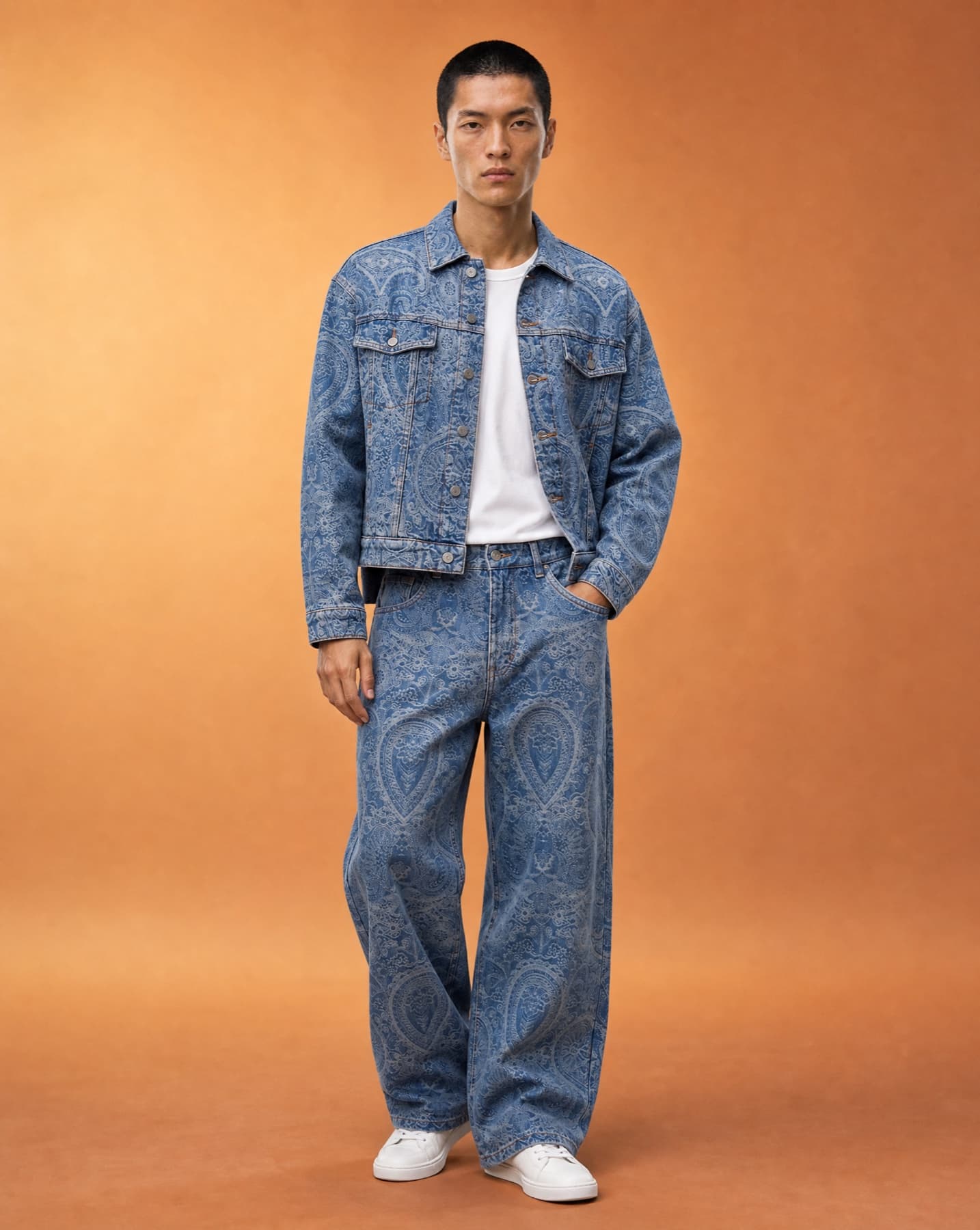 Front-facing fashion campaign image of the blue paisley denim look