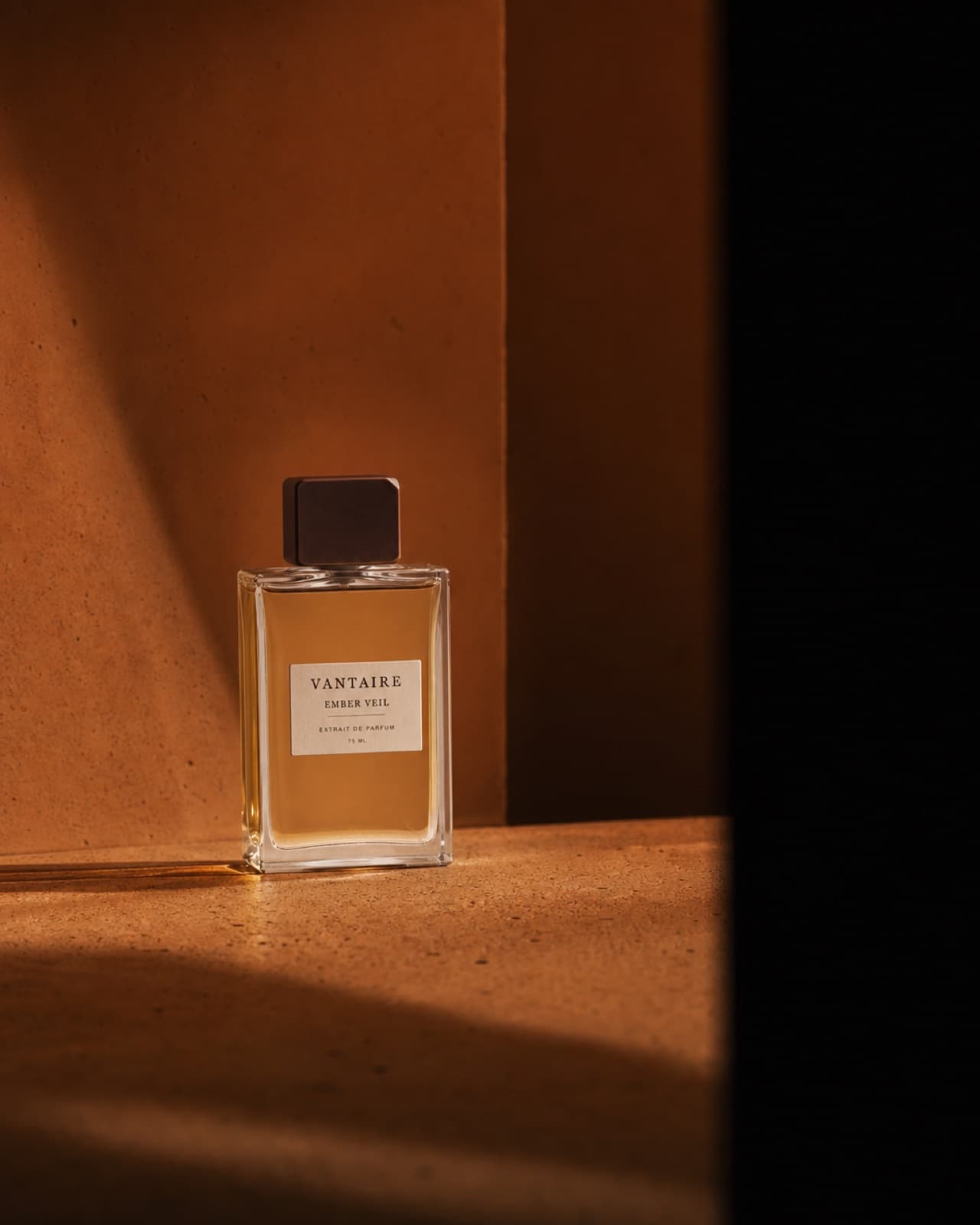 Ember Veil fragrance campaign image with a long ember-toned shadow