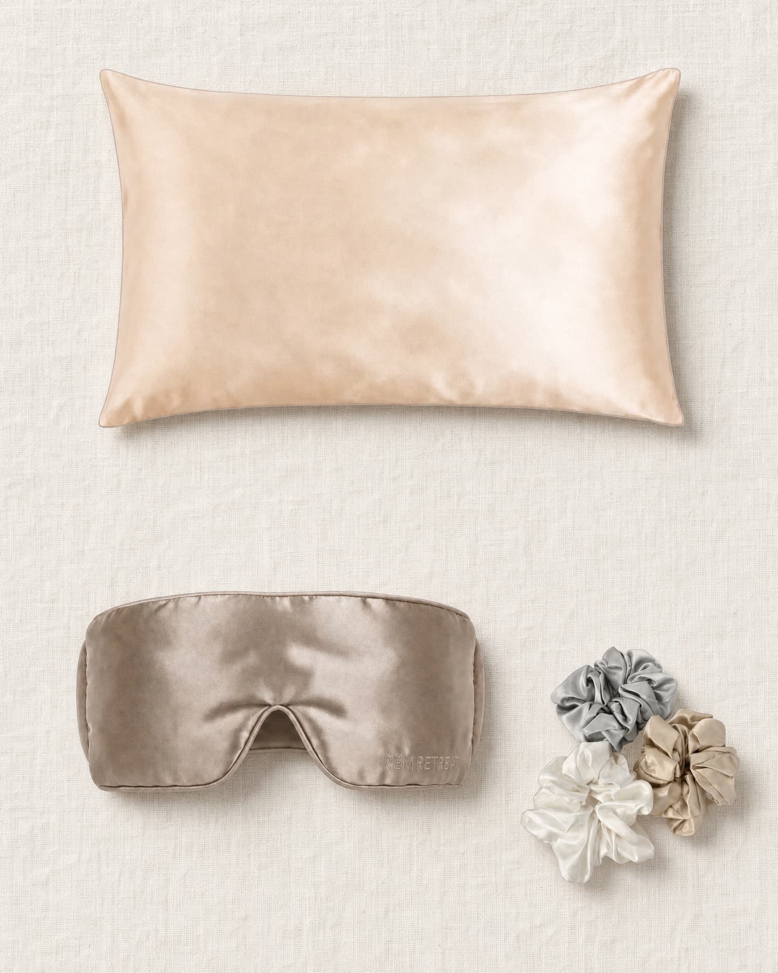 Complete champagne REM Retreat sleep set flat lay