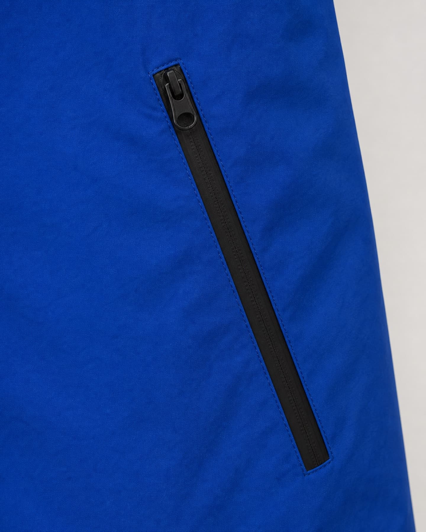 Clean product detail of the Seamform shell pocket zip
