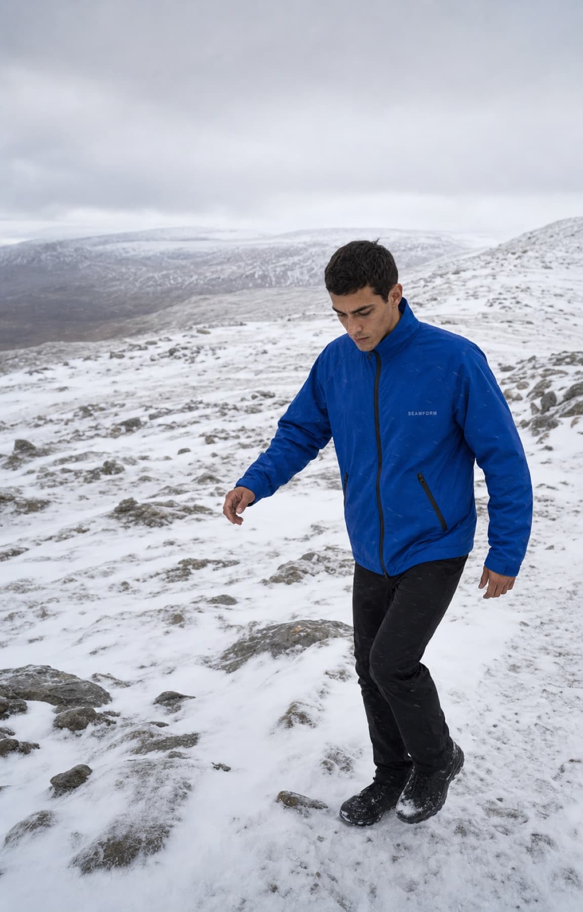 Seamform technical shell worn while crossing a snowy mountain pass