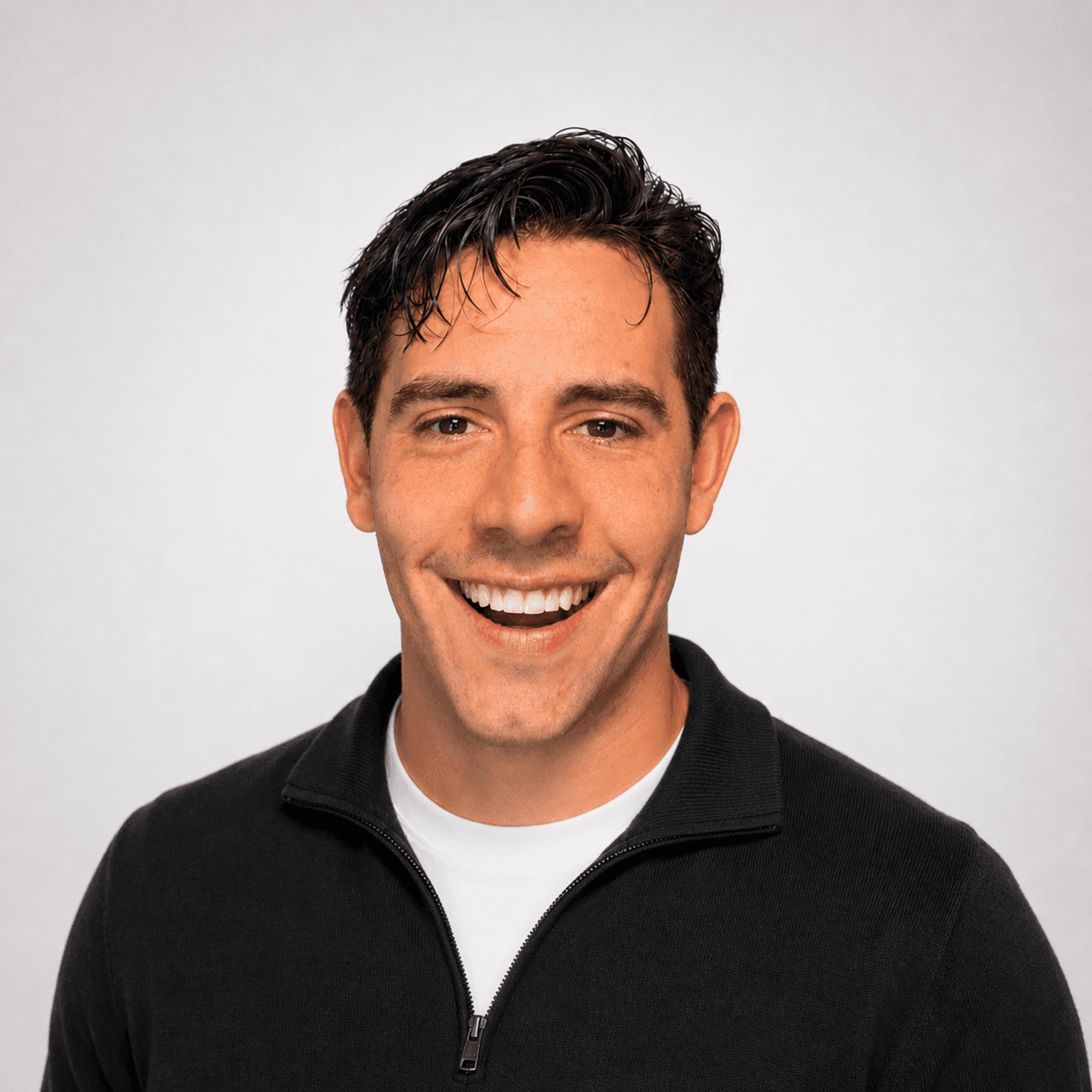 Bailey Sadler smiling in a professional studio portrait
