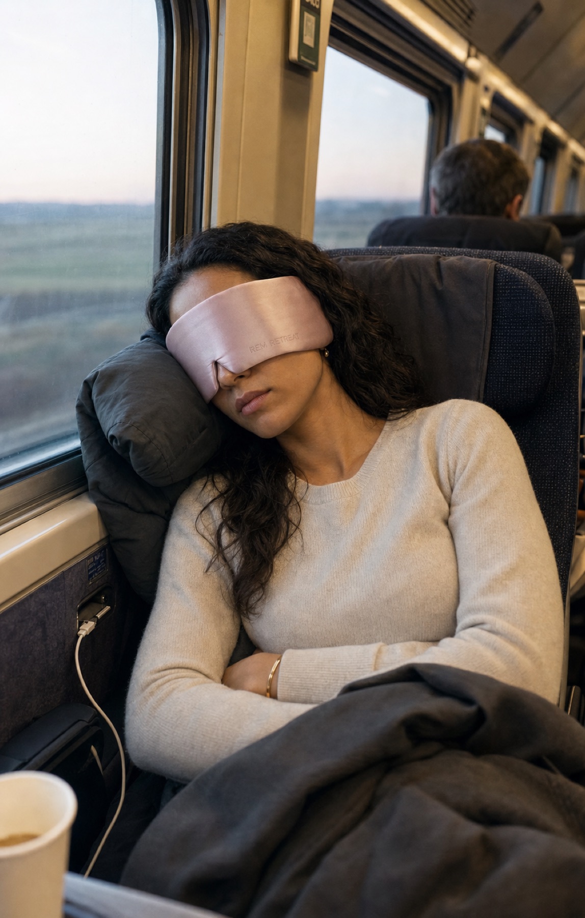 REM Retreat hush pink sleep mask used on a dawn train
